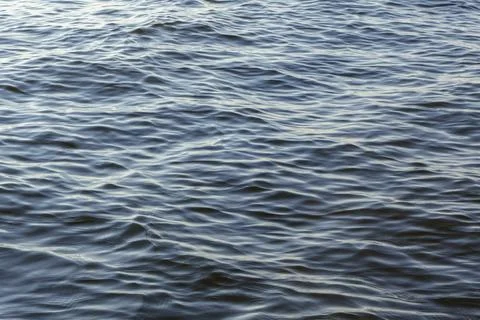 Sea water surface close-up, background for design and relaxation Stock Photos