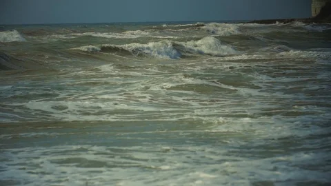 Sea wave. The black sea in the spring. Muddy sea water. Slow wave movement. Stock Footage 90971453