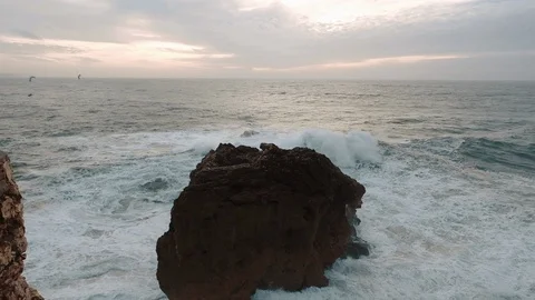 Sea Wave Breaks On Beach Rocks Landscape. Sea Waves Crash And Splash On Rocks. Stock-Footage 107554420