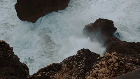 Sea Wave Breaks On Beach Rocks Landscape. Sea Waves Crash And Splash On Rocks. Stock-Footage 107554591