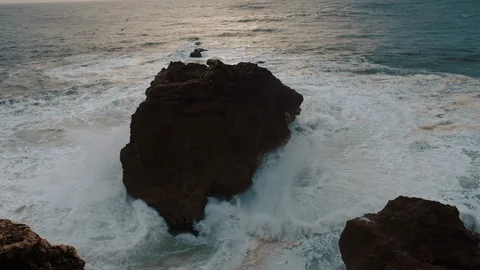 Sea Wave Breaks On Beach Rocks Landscape. Sea Waves Crash And Splash On Rocks. Stock-Footage 107554744