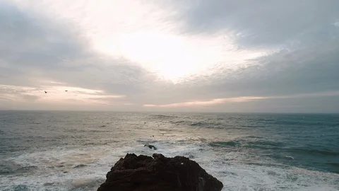 Sea Wave Breaks On Beach Rocks Landscape. Sea Waves Crash And Splash On Rocks. Stock-Footage 107554793
