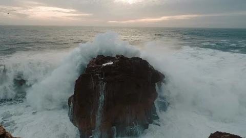 Sea Wave Breaks On Beach Rocks Landscape. Sea Waves Crash And Splash On Rocks. Stock-Footage 107554912