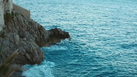 Sea Wave Breaks On Beach Rocks Landscape. Video stock 112735058