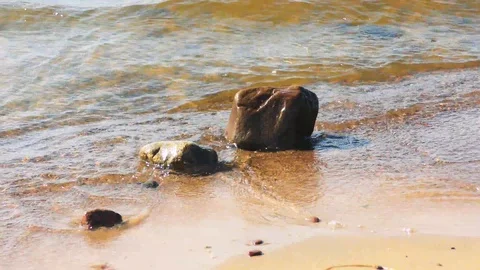 The sea wave breaks on the rocks Stock Footage 115627843