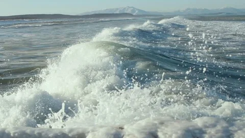Sea wave bubbling foam snow, sea in winter. Stock Footage 122518331