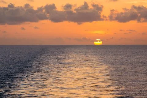 Sea wave close up, low angle view, sunrset shot Stock Photos