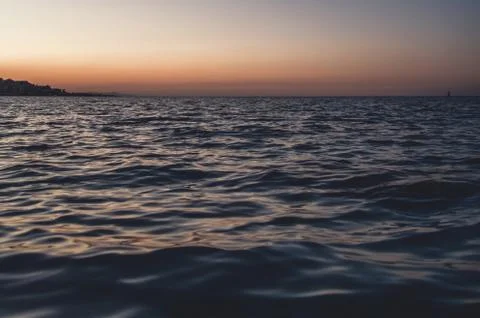 Sea wave close up, low angle view, sunrsie shot Foto stock