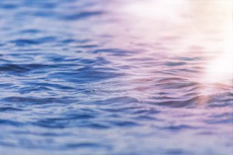Sea wave close up with low angle view sunrsie shot. Background texture for te Stock Photos