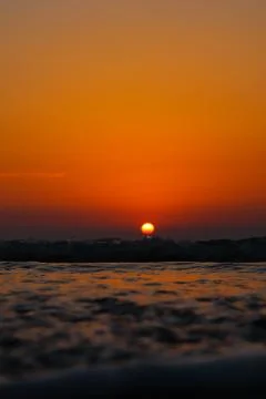 Sea wave close up, low angle view of a sunset on the ocean. Foto stock