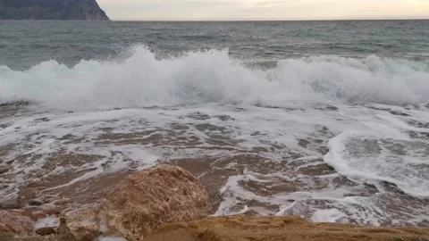 Sea wave close-up rolls on the sandy beach Stock Footage 152277166