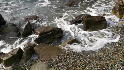 Sea wave close-up rolls on the sandy beach. Stock-Footage 159267295