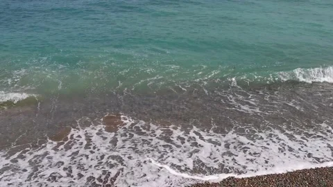 Sea wave close-up rolls on the sandy beach Stock Footage 166882333