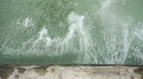 Sea Wave Crashing Against a Wall. Slow Motion Stock Footage 59793941