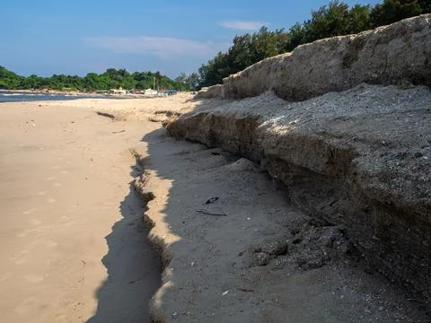 Sea wave eroding a sandy beach. Beach eroded gulf of Thailand. Chalathat beac Stock Photos