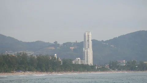 Sea wave hit the rock shore seascape , Patong sand beach Phuket  parasail , h Video stock 91237688