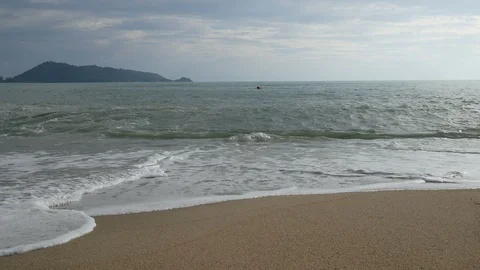 Sea wave hit sand beach with horizon skyline and  blue evening sky background Stock Footage 91453532