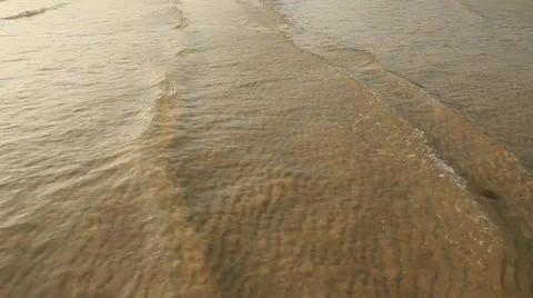 Sea wave over sand Stock Footage 22606685