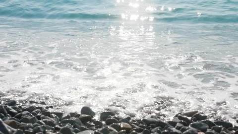Sea wave pebbles, close up, slow motion Stock Footage 116780134