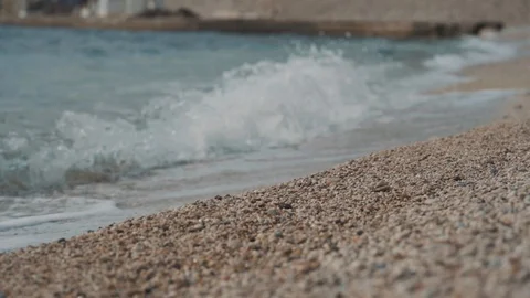 The sea wave rolls on the shore Video stock 128684772