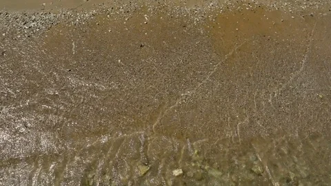 Sea wave on the sand of the beach close-up Stock Footage 94687572