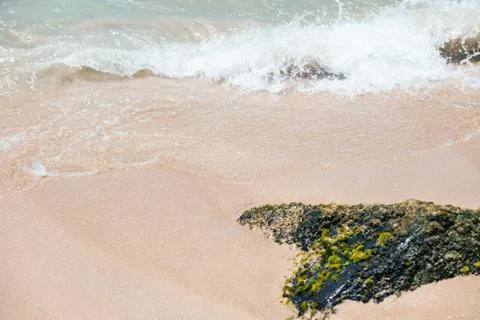 Sea wave to the sandy beach Stock Photos
