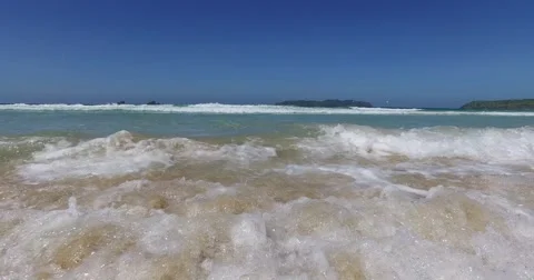 Sea wave on a sandy beach a summer day Stock Footage 61168535