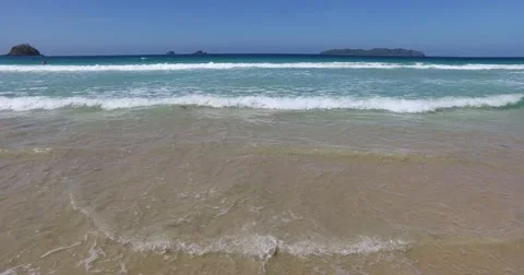 Sea wave on a sandy beach a summer day Stock Footage 61168545
