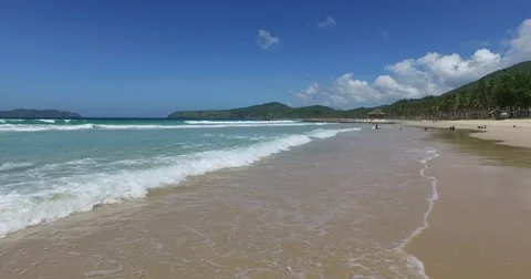 Sea wave on a sandy beach a summer day Stock Footage 61168621