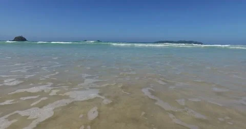 Sea wave on a sandy beach a summer day Stock Footage 61168666