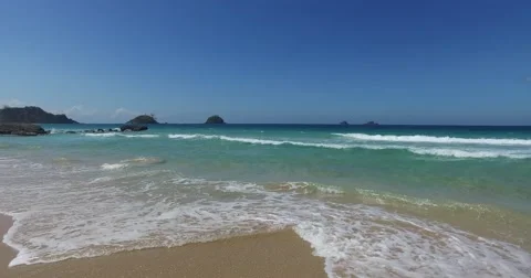 Sea wave on a sandy beach a summer day Stock Footage 61168823