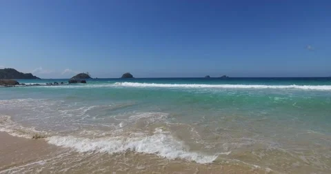 Sea wave on a sandy beach a summer day Stock Footage 61168935