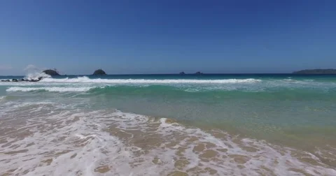 Sea wave on a sandy beach a summer day Stock Footage 61168964