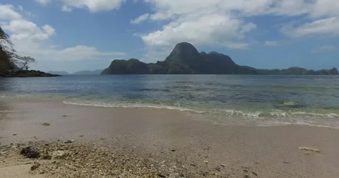 Sea wave on a sandy beach a summer day Stock Footage 61237308