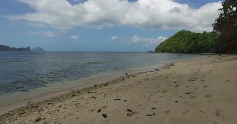 Sea wave on a sandy beach a summer day Stock Footage 61237323