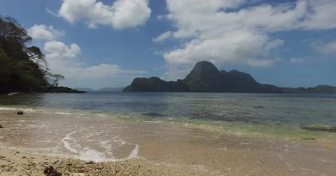 Sea wave on a sandy beach a summer day Stock Footage 68763961