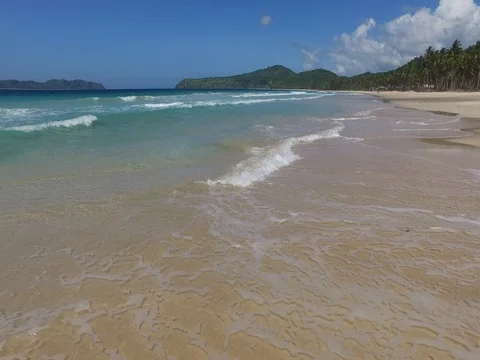 Sea wave on a sandy beach a summer day Stock Footage 70064865