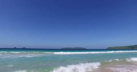 Sea wave on a sandy beach a summer day Stock Footage 70064919