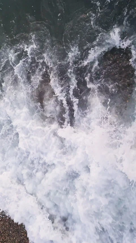 Sea wave with splashes on the beautiful beach. Vertical video. Stock Footage 267184397