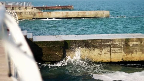 Sea Wave washed concrete pier, Stone Barrier Stock Footage 75265080