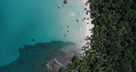 Sea wave on white snad beach green tropical forest island aerial view Stock-Footage 104307220