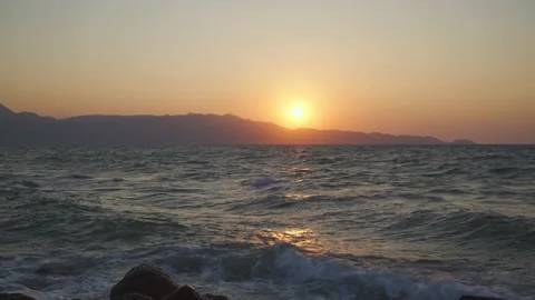 Sea waves against the background of mountains Stock Footage 159586700