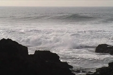 Sea waves against rocks Stock Footage 116289