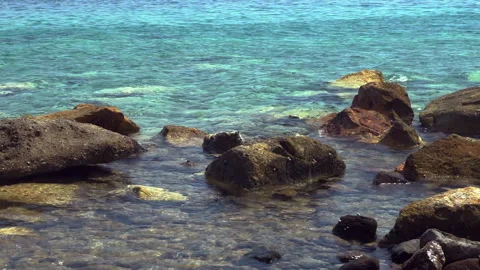 Sea waves among the rocks 動画素材 259307962