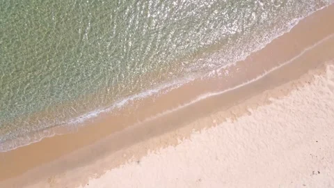 Sea waves and beach top view, natural background. Stock Footage 311041579