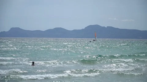Sea waves and kid playing Stock Footage 128351907