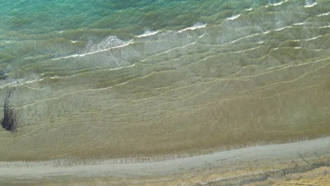 Sea waves and left pan. Aerial, nature beach, sands and sunset Stock Footage 149323923