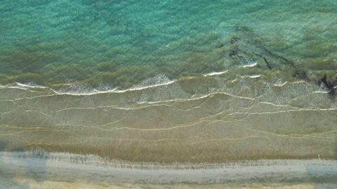 Sea waves and right pan. Aerial, nature beach, sands and sunset Stock Footage 149323744