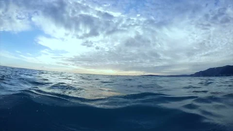 Sea waves and sky seen from speedboat moving across sea, water hitting boat Stock-Footage 89186486
