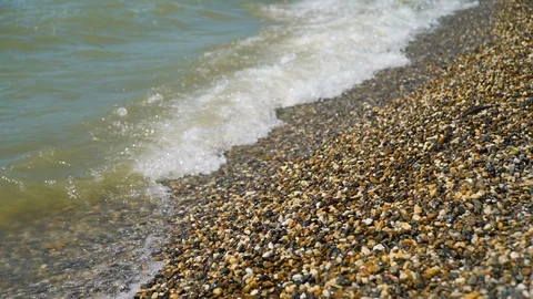 Sea Waves and the Stone Beach Stock Footage 112861648